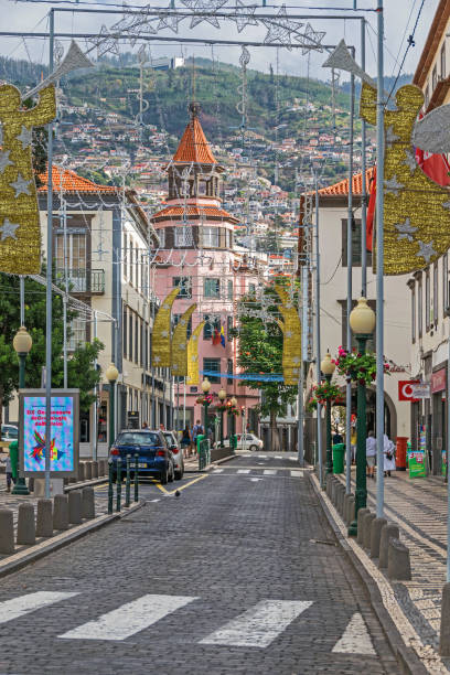 Aljube Street with Christmas decoration in Funchal, Madeira Funchal, Portugal -  November 10, 2019: Historic centre and Aljube Street with Christmas decoration, popular destination for New Year's Eve funchal christmas stock pictures, royalty-free photos & images