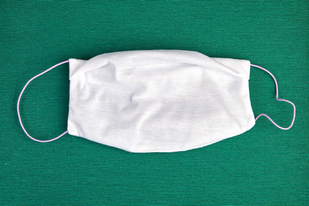wiederverwendbare stoff gesichtsmaske für tägliches waschen. - gauze healthcare and medicine disposable bandage stock-fotos und bilder