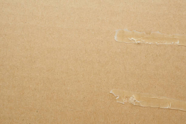 istock Brown eco recycled cardboard paper sheet texture background 1221892853