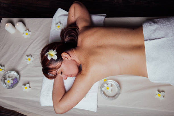 istock the beautiful girl lying in Spa massage sauna 1221892886