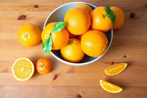 White bowl with oranges
