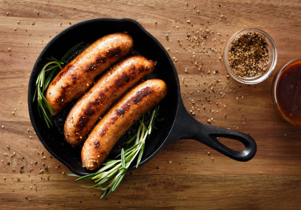 istock Sausages in a skillet 1221897350
