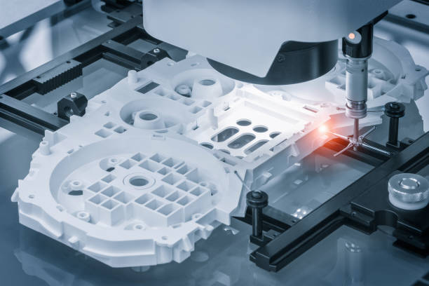 Operator inspection dimension metal parts by CMM after machining process in industrial factory. industry concept