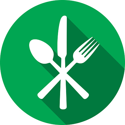 Vector illustration of a crossed fork, knife, and spoon against a green background icon in flat style.