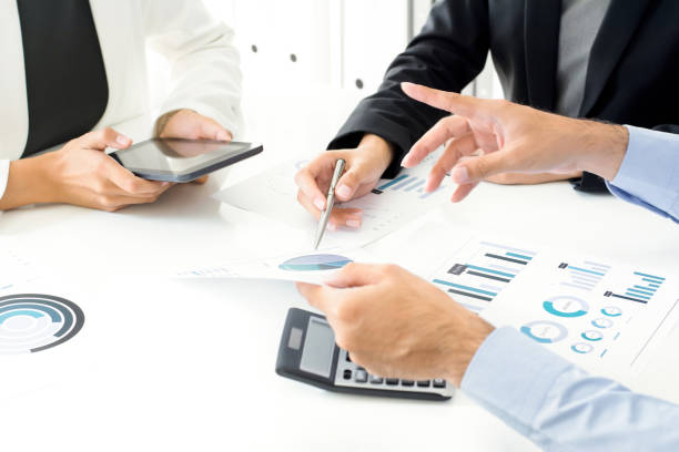 istock Business people discussing financial document in the meeting 1221914049