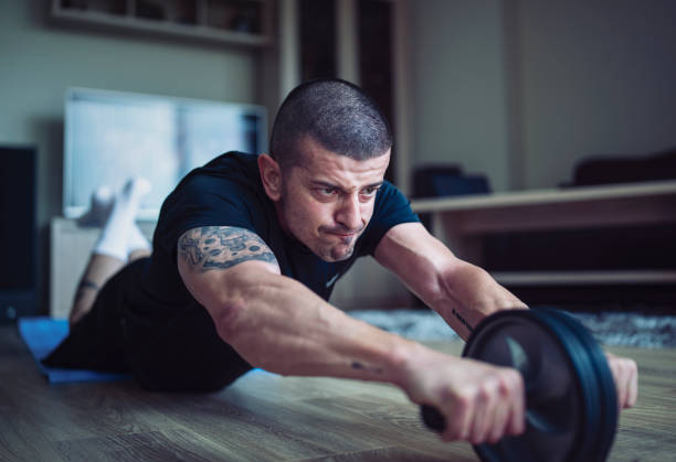 istock Adult Man Training At Home 1221914368