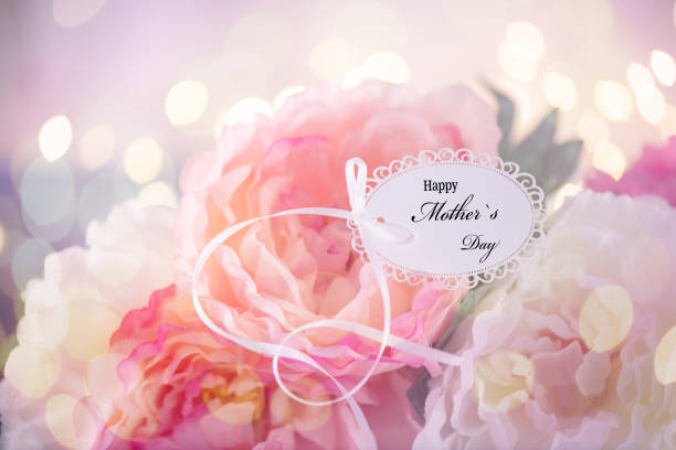 istock Mother`s Day Greeting Card on a Flower Arrangement 1221915209