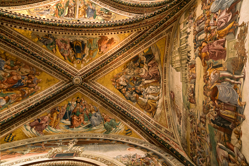 Striking art fresco of the Last Judgment (Giudizio Universale), created by Luca Signorelli in 1499, covers the ceiling in the Cappella di San Brizio chapel inside the Duomo of Orvieto, (said to have influenced Michelangelo who visited before he began painting the Sistine Chapel), Orvieto, Italy, Europe