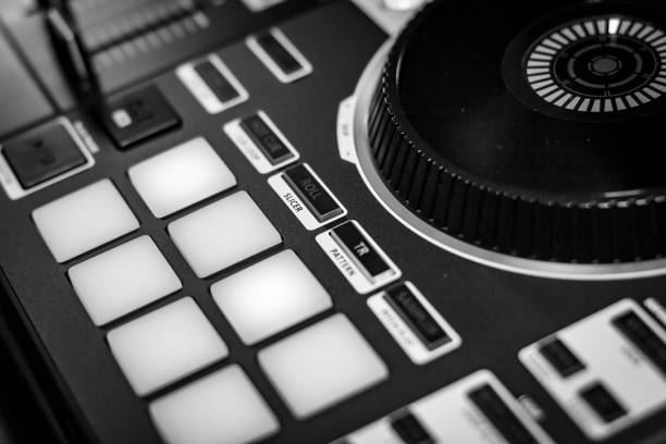 istock Clean DJ Console showing turn table and performance pads in music studio industry 1221916524