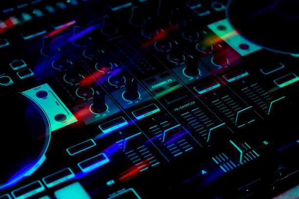 istock Portable Mobile Dj Controller Showing Mixer Section With Sliders & Knobs In Dark Club 1221917160
