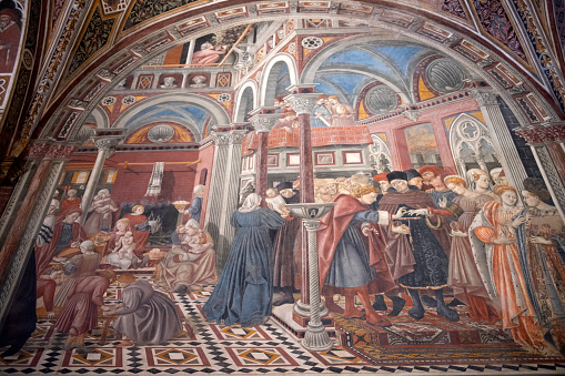 Siena, Italy - May 14, 2018. Fresco inside the ancient hospital of Santa Mario Della Scala in Siena, Italy.
