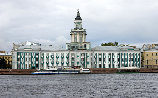 View of the Kunstkamera museum across the Neva river, early 18th century building, St. Petersburg, Russia