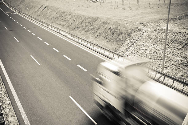 istock truck is going along the asphalt highway 122192047