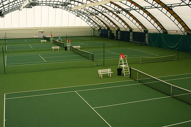 Indoor tennis court stock photo