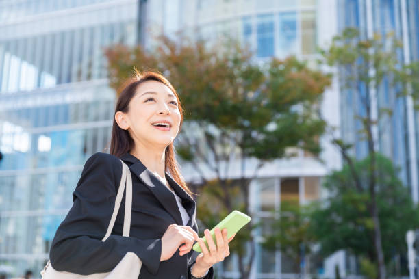 istock asian woman who see a smart phone 1221923044