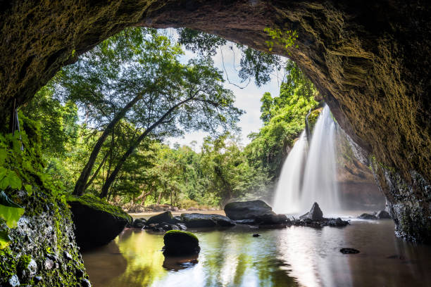 istock Waterfall on mountain cliff in the tropical rain forest. 1221926872