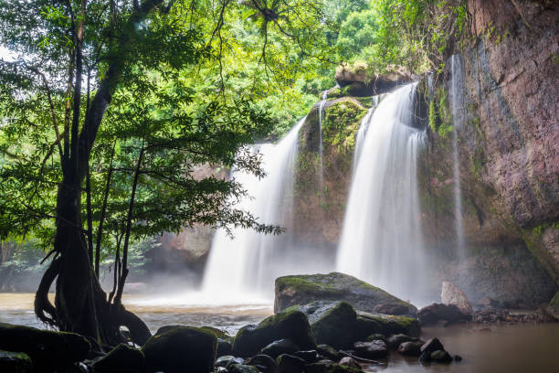 istock Waterfall on mountain cliff in the tropical rain forest. 1221926941