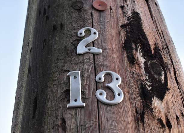istock Power pole with numbers 2, 1 and 3 attached. 1221928554