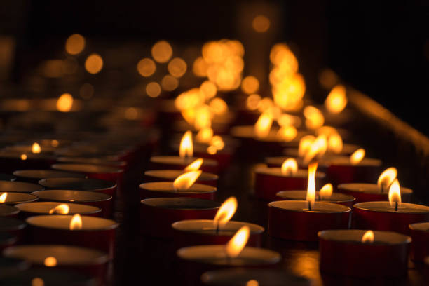 istock The view of lighted tealight candles. Burning candles. 1221934621