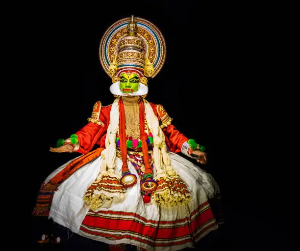This image is the posture and facial expression of famous indian classical dance kathakali. which is performed at south indian state of kerala.
