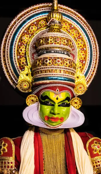 Photo of Kathakali kerala classical dance mens facial expression in traditional costume