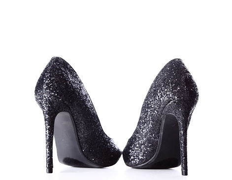 black high heels on white background