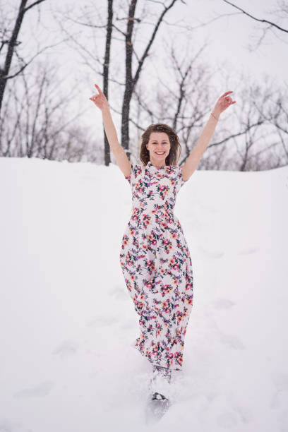 istock Smiling young woman outdoors on the snow 1221937574