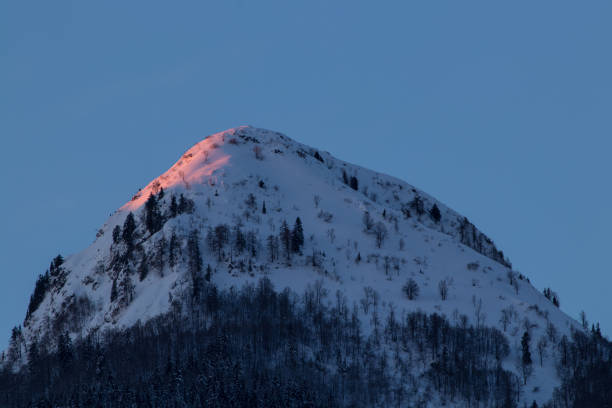 istock Sunlit mountain Lisc in Bohinj valley 1221943767