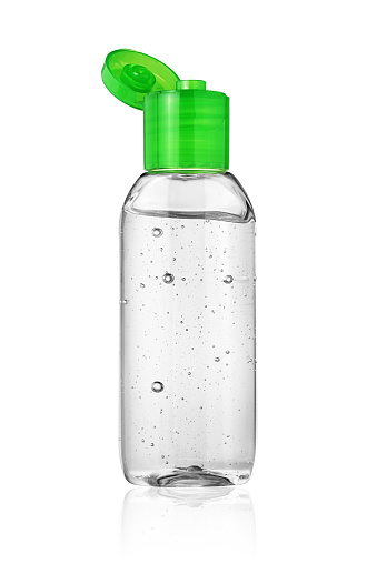 Botella abierta de desinfectante de manos o gel antiséptico aislado en blanco photo