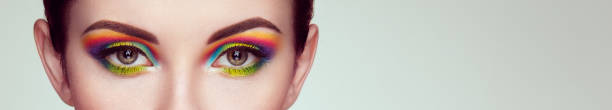 istock Female eye with  rainbow make-up 1221947900