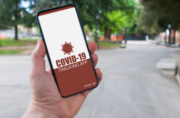 istock Man using a covid-19 tracking app to prevent contagion from coronavirus 1221950726
