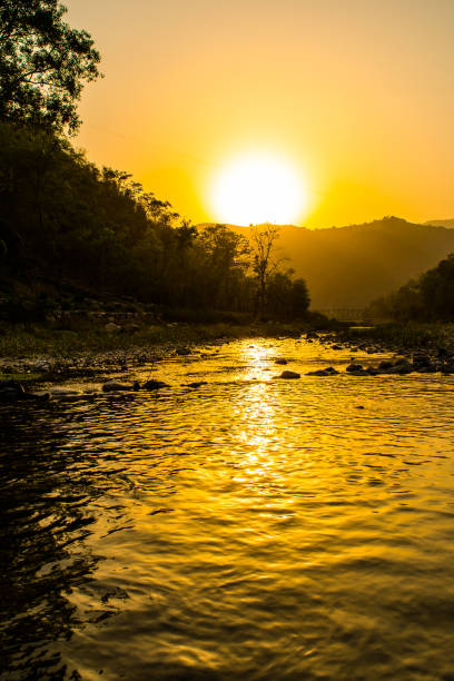 ganga river at rishikesh, located in the foothills of the himalayas in northern india, - garhwal imagens e fotografias de stock