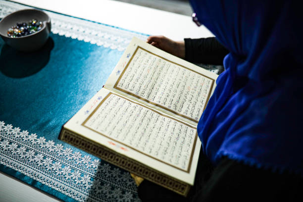 istock Woman is reading Quran in Ramadan. 1221958327