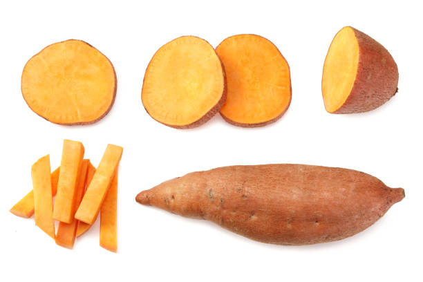 istock sliced sweet potatoes isolated on white background. top view 1221961099
