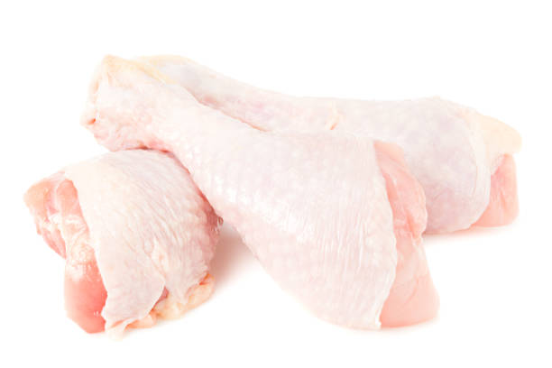 istock Raw chicken legs isolated on white background 1221961687
