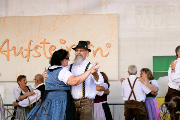 Folk dances of Styrian men and women stock photo
