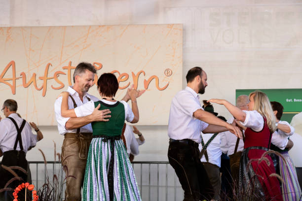 folk dances of styrian men and women - dirndl traditional clothing austria traditional culture imagens e fotografias de stock