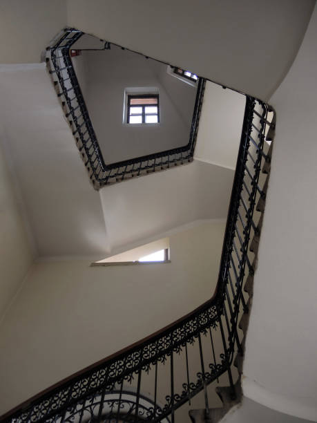 istock View of staircase looking up indoors 1221964007