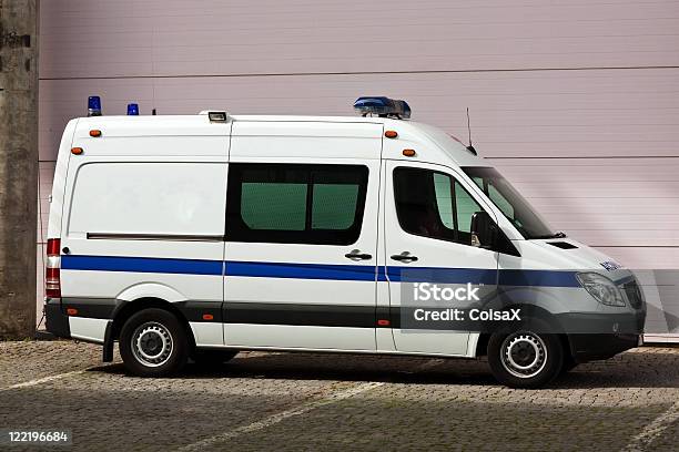 Unmarked White Ambulance Parked Stock Photo - Download Image Now - Alertness, Ambulance, Assistance