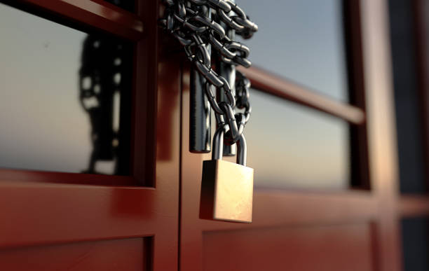 Shop Door Chained Lockdown A red generic storefont door chained shut and locked with a chain an padlock - 3D render padlock stock pictures, royalty-free photos & images