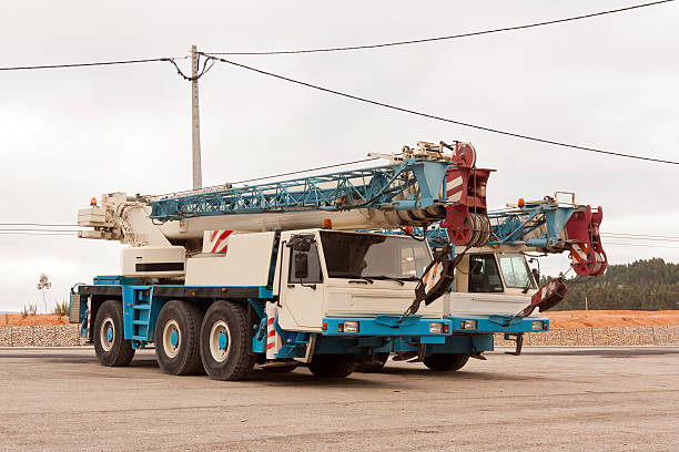 istock Two auto cranes standing in a parking lot 122196995