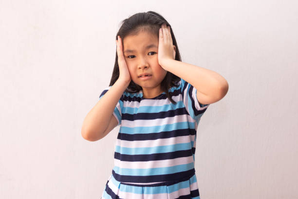 istock Asian girl feeling the strain. 1221970665