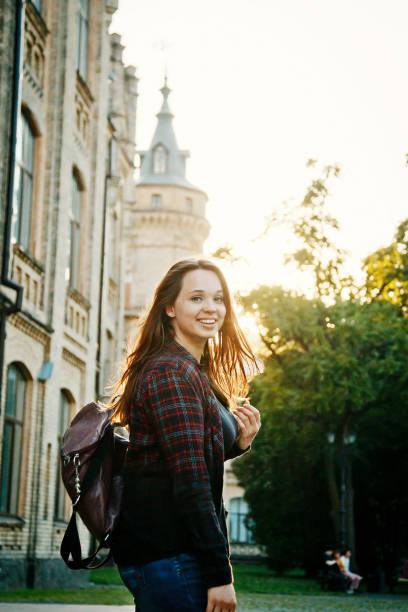 istock student girl near the university building 1221970668