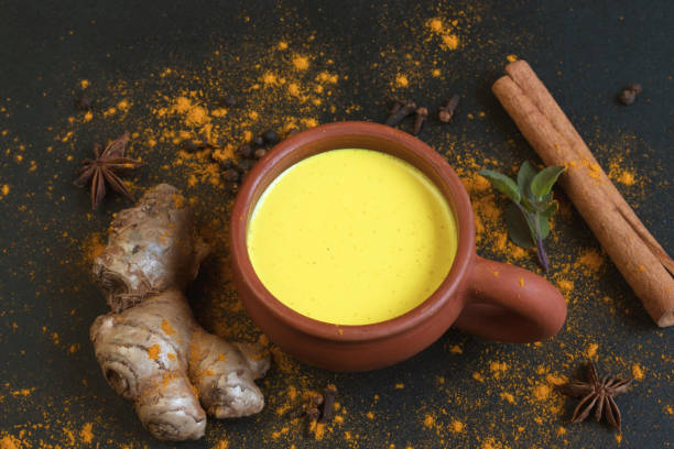 istock Turmeric milk surrounded with many herbs good for internal immune system apart from having anti inflammatory and anti oxidant propertie 1221973926