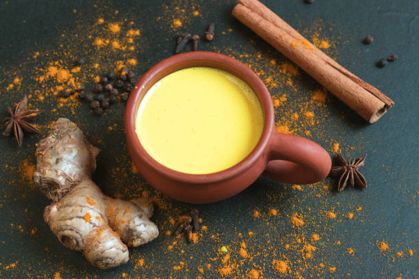 istock Turmeric milk surrounded with many herbs good for internal immune system apart from having anti inflammatory and anti oxidant propertie 1221973948