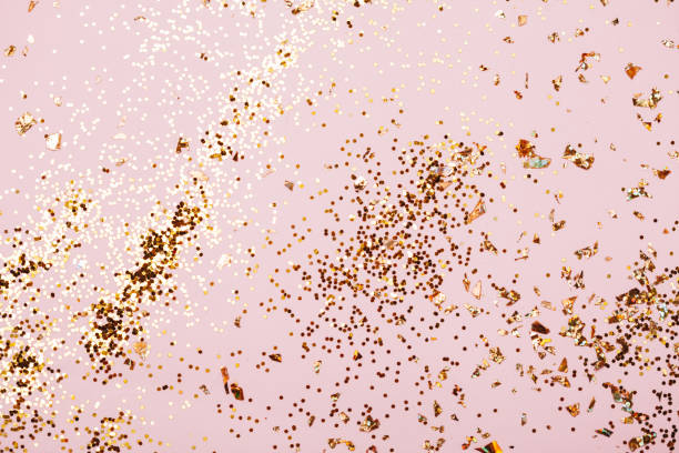 istock Pink confetti and stars and sparkles on pink background. 1221973953