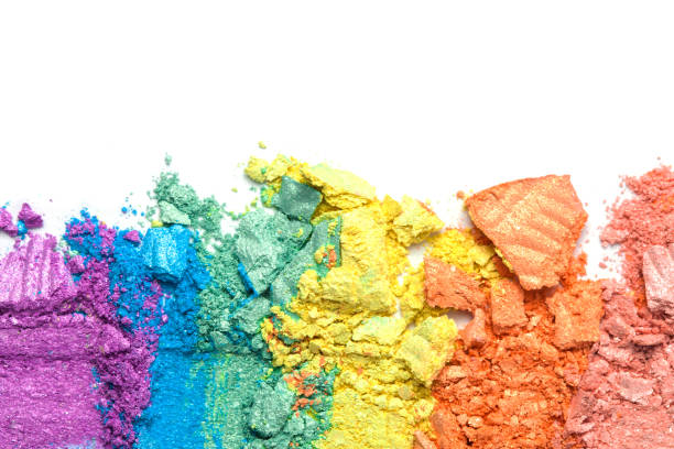 istock A broken rainbow colored eye shadow smear, make up palette isolated on a white background. 1221973958