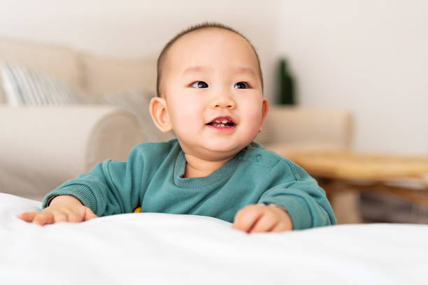 istock Asian infant smiling towards the camera 1221974861