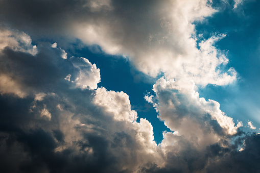 A moody and atmospheric close up of clouds during sunset