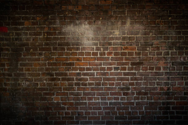 Old textured red brick wall stock photo